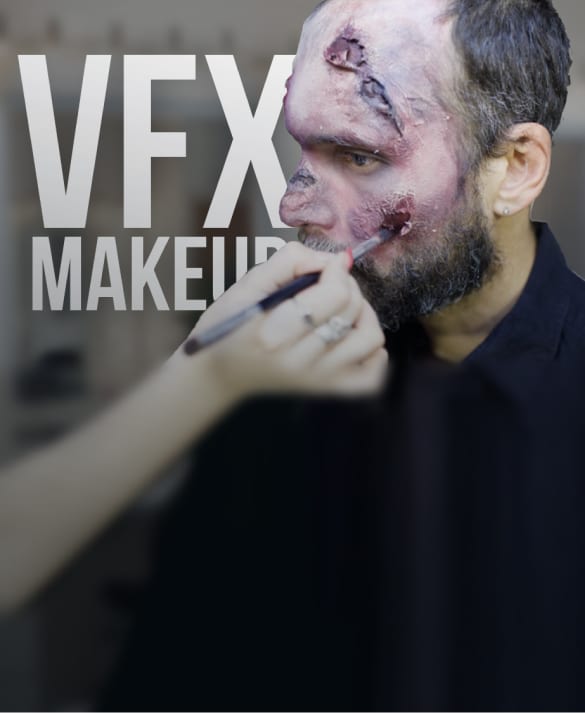 VFX Makeup artist from Dragonfly's production team using special effects to create zombie skin on an actor