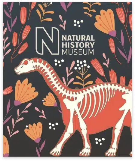 A Poster For The Natural History Museum Featuring A Dinosaur Skeleton Against A Dark Background With Orange And Purple Flowers. The Museum'S Name Is Displayed At The Top In White Text With A Large 'N' In The Left Corner, Inviting Visitors To Explore More Through Their Engaging Video Campaigns. A poster for the Natural History Museum featuring a dinosaur skeleton against a dark background with orange and purple flowers. The museum's name is displayed at the top in white text with a large 'N' in the left corner, inviting visitors to explore more through their engaging video campaigns.