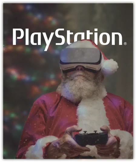 Santa Claus Is Wearing A Virtual Reality Headset And Holding A Game Controller, With A Festive, Colorful Background. The Playstation Logo Is Displayed Prominently At The Top Of The Image. Meet The Team Behind This Magical Scene—The Dragonfly Team. Santa Claus is wearing a virtual reality headset and holding a game controller, with a festive, colorful background. The PlayStation logo is displayed prominently at the top of the image. Meet the team behind this magical scene—the Dragonfly Team.