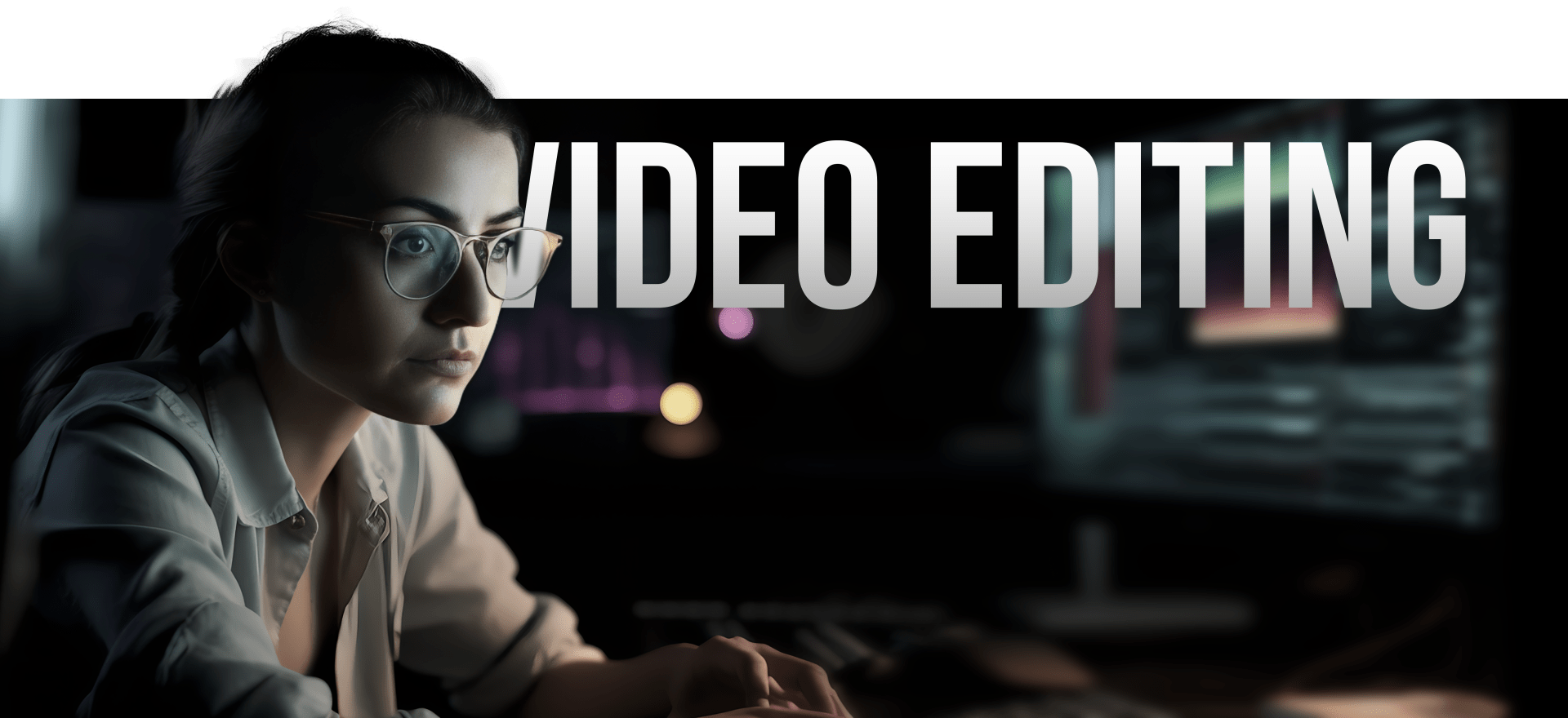 A Focused Individual Wearing Glasses Works On A Computer That Displays Various Video Editing Software Tools. The Scene Is Dimly Lit, With &Quot;Video Editing&Quot; Boldly Written Above Them. The Background Features Colorful, Blurred Lights And Several Monitors. A focused individual wearing glasses works on a computer that displays various video editing software tools. The scene is dimly lit, with "VIDEO EDITING" boldly written above them. The background features colorful, blurred lights and several monitors.